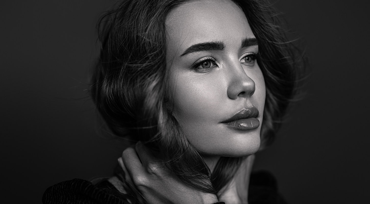 Black and white portrait of a woman.